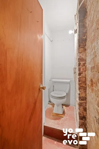 a hallway with cabinet doors