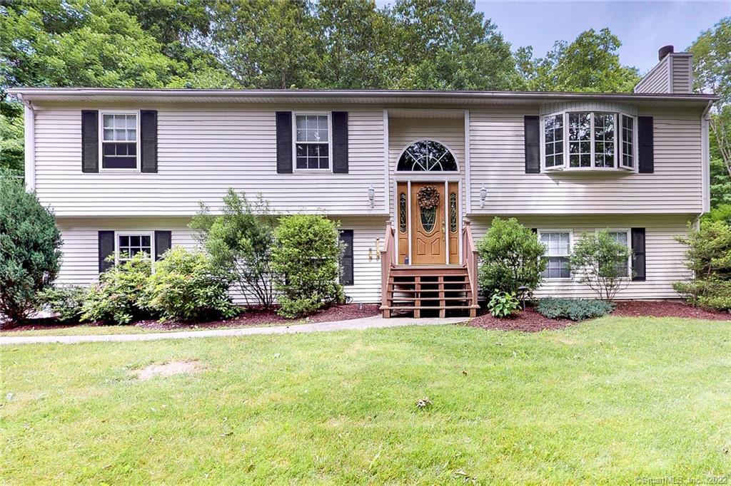 521 Purdy Hill Road Monroe, CT 06468 - Photo 1 of 1 front view of a house with a yard