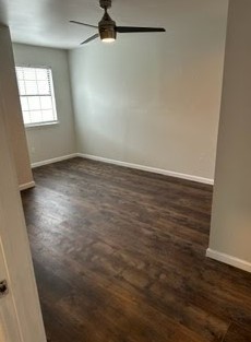 4520 Speedway, Unit A Austin, TX 78751 - Photo 7 of 18 Rich wood-look flooring sets a warm foundation in this versatile secondary bedroom space.