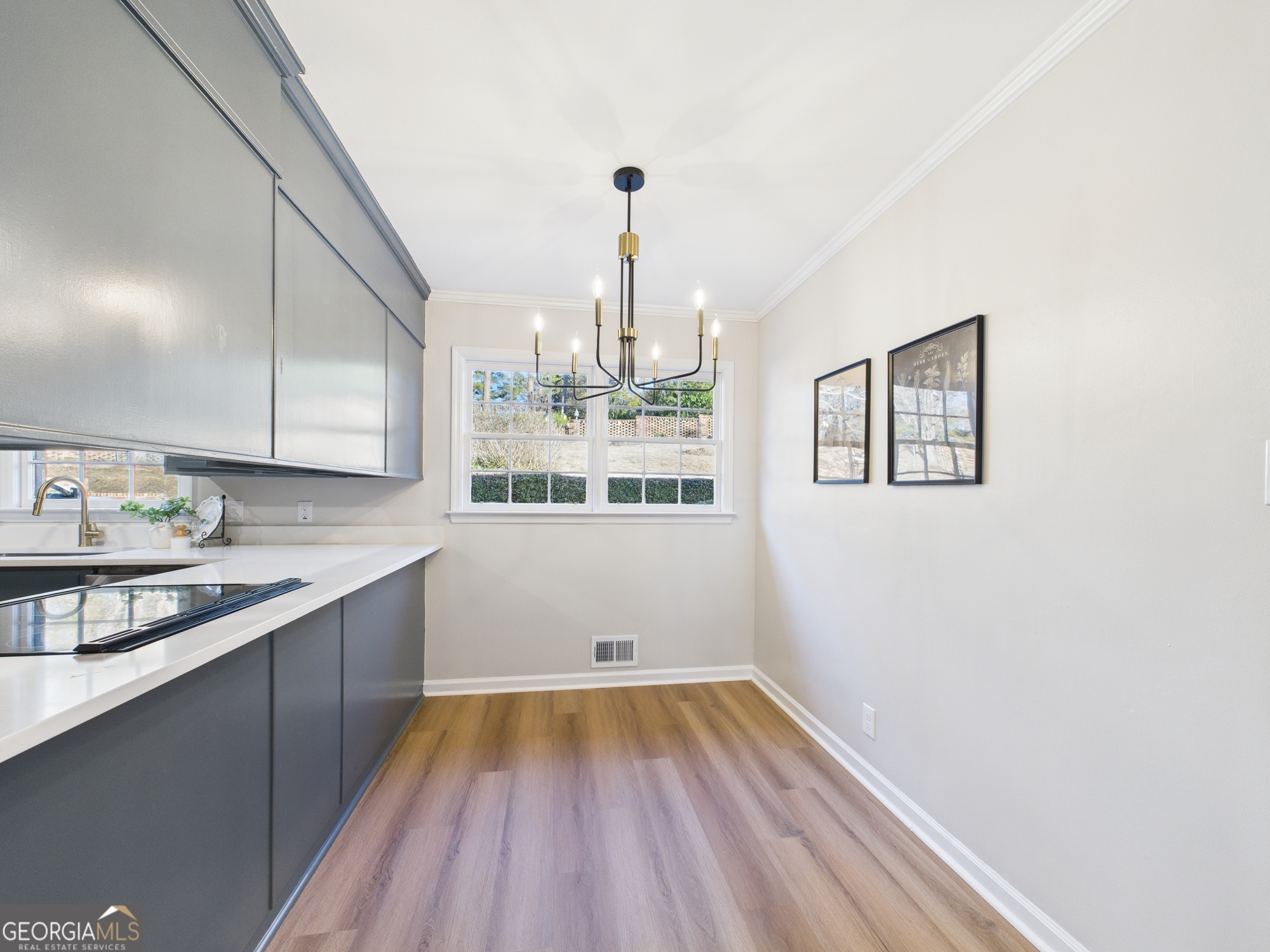 511 Pierce Avenue Macon, GA 31204 - Photo 14 of 57 a view of kitchen with wooden floor and window