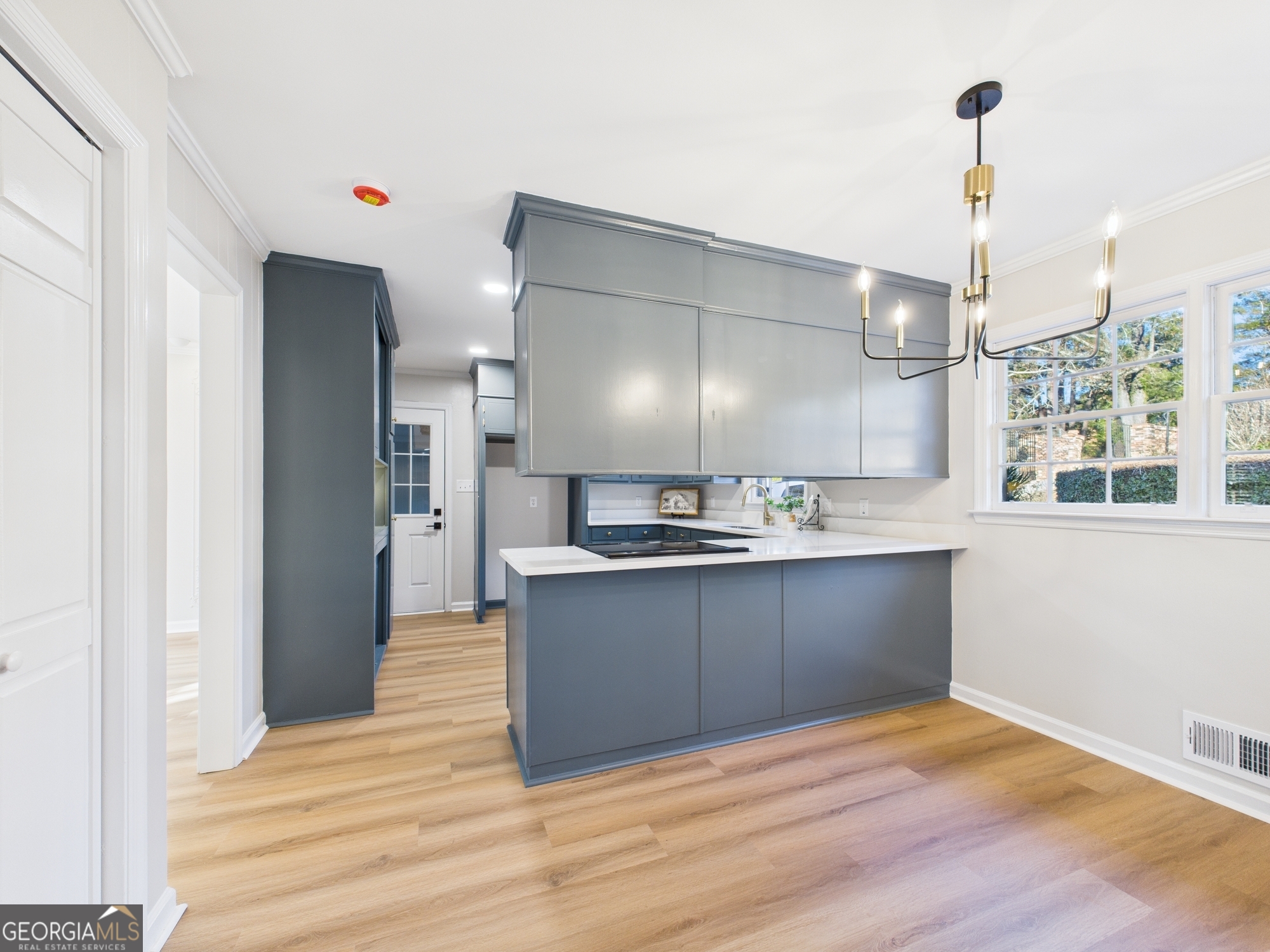 511 Pierce Avenue Macon, GA 31204 - Photo 16 of 57 a large kitchen with kitchen island a sink stainless steel appliances and cabinets