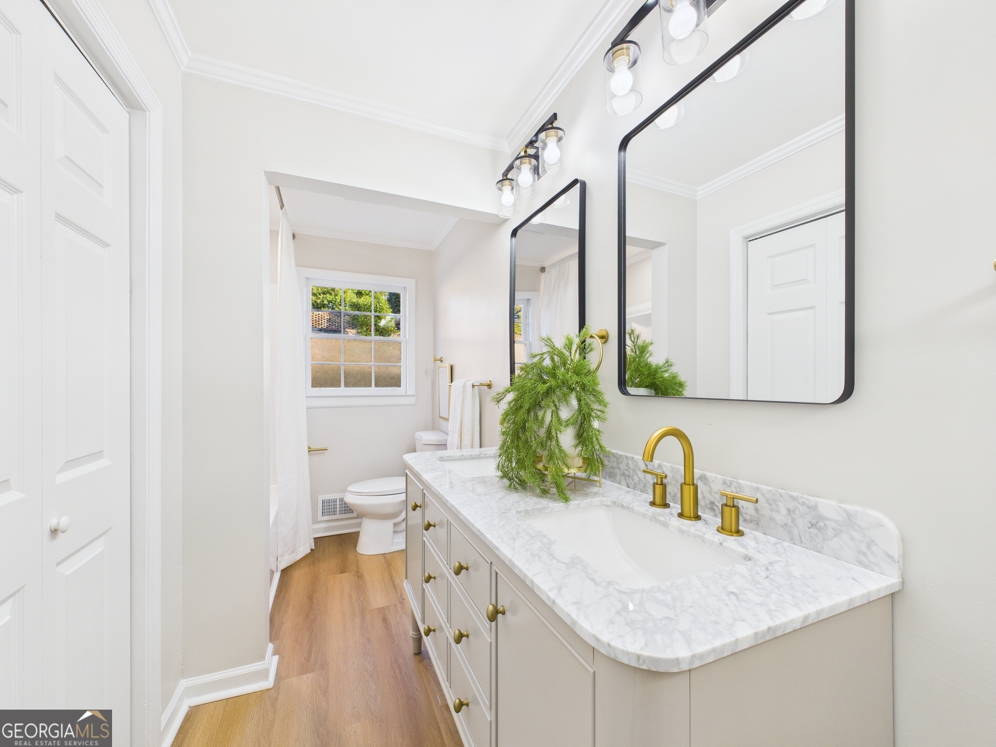 511 Pierce Avenue Macon, GA 31204 - Photo 34 of 57 a bathroom with a sink and a mirror