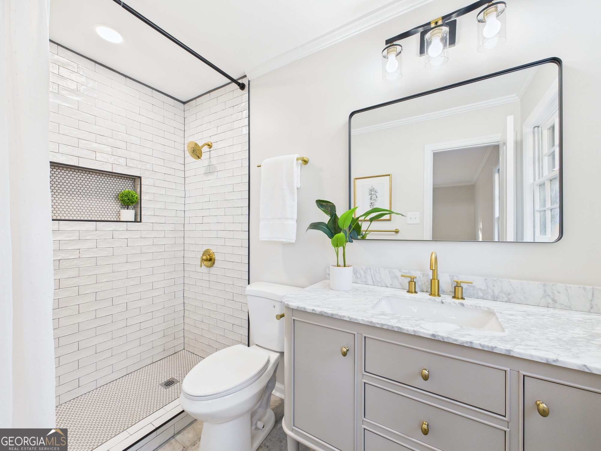 511 Pierce Avenue Macon, GA 31204 - Photo 42 of 57 a bathroom with a granite countertop toilet sink and mirror