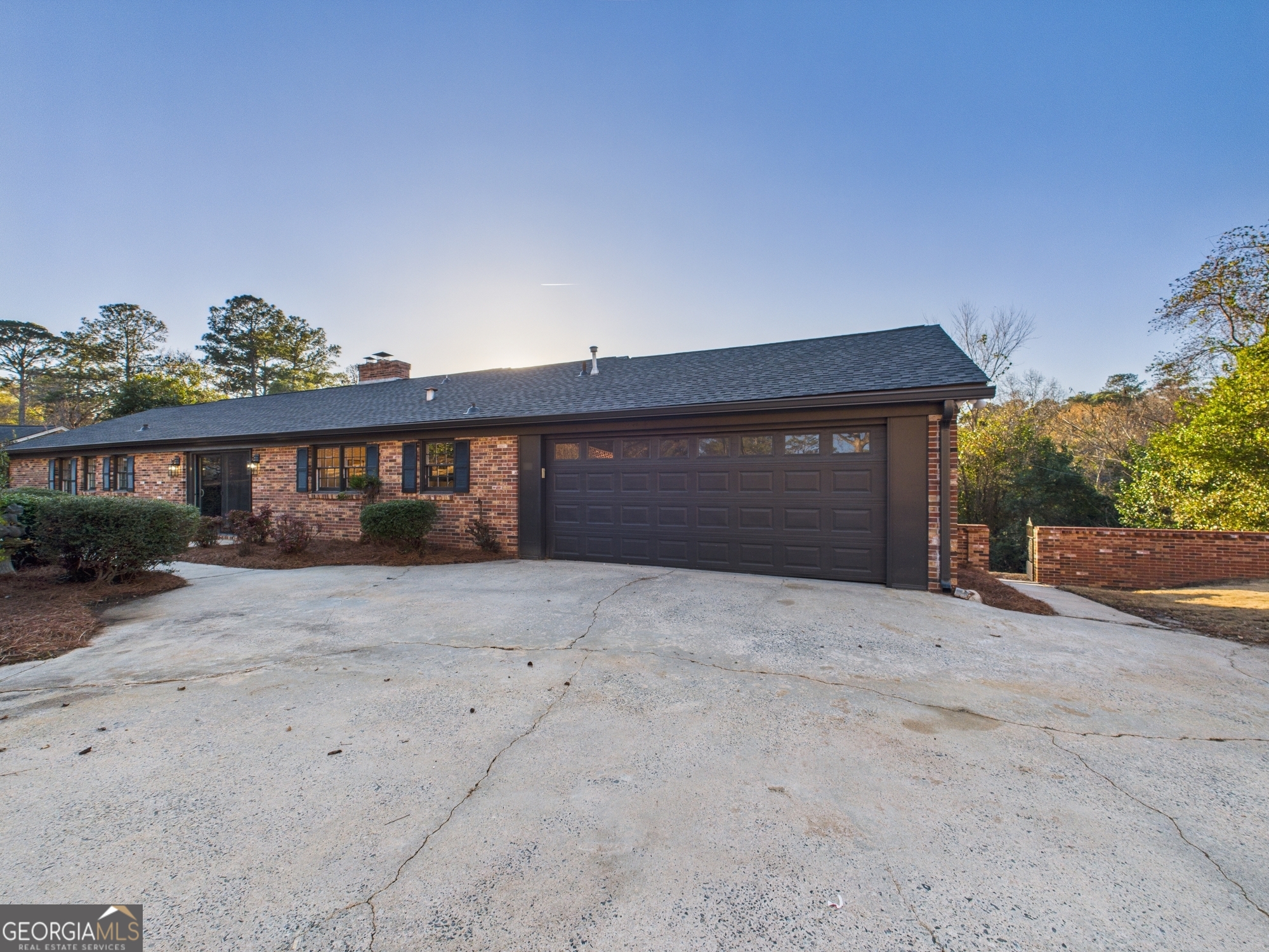 511 Pierce Avenue Macon, GA 31204 - Photo 52 of 57 a front view of a house with a yard and garage