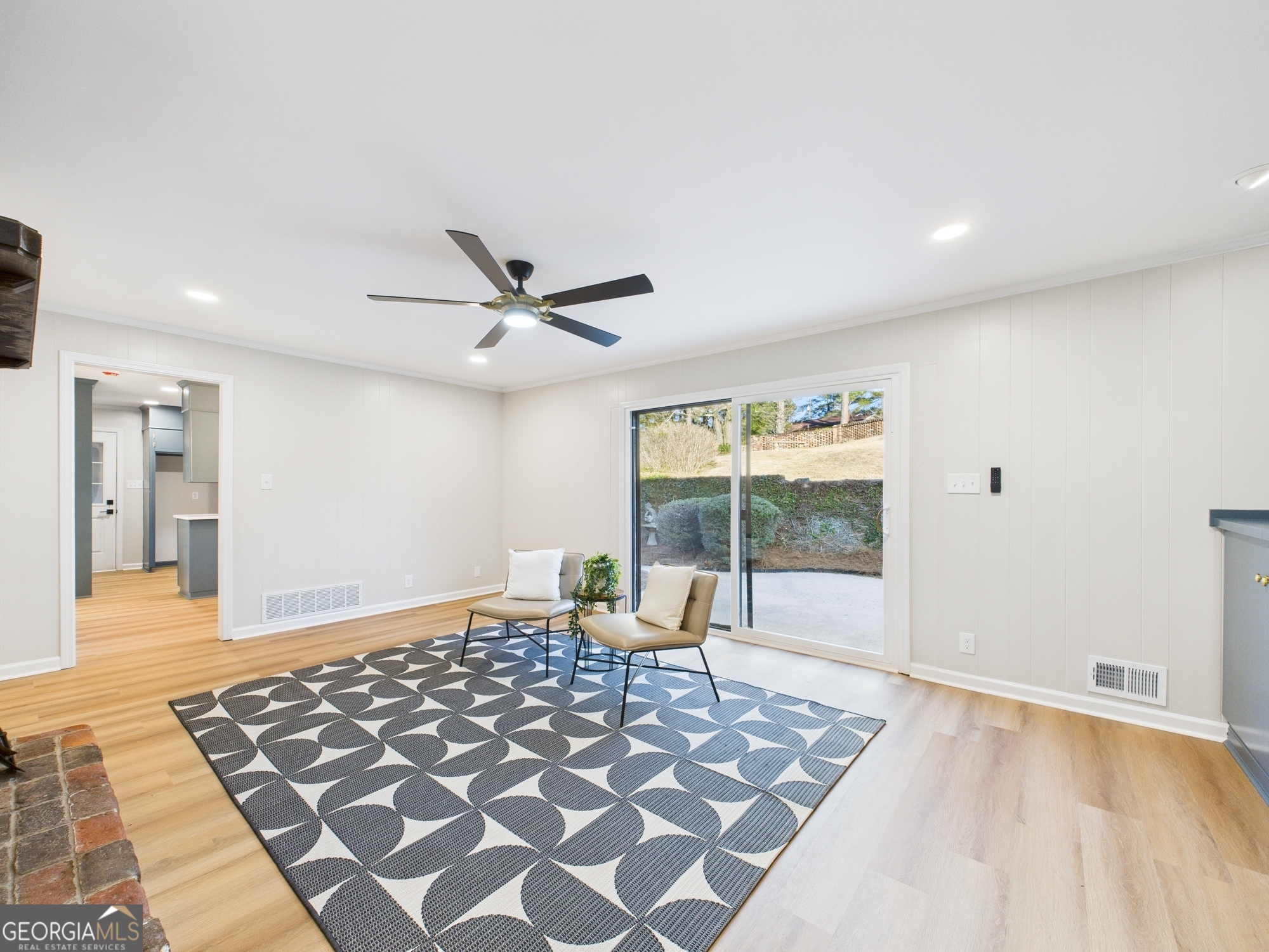 511 Pierce Avenue Macon, GA 31204 - Photo 6 of 57 a living room with a rug floor to ceiling window and a rug