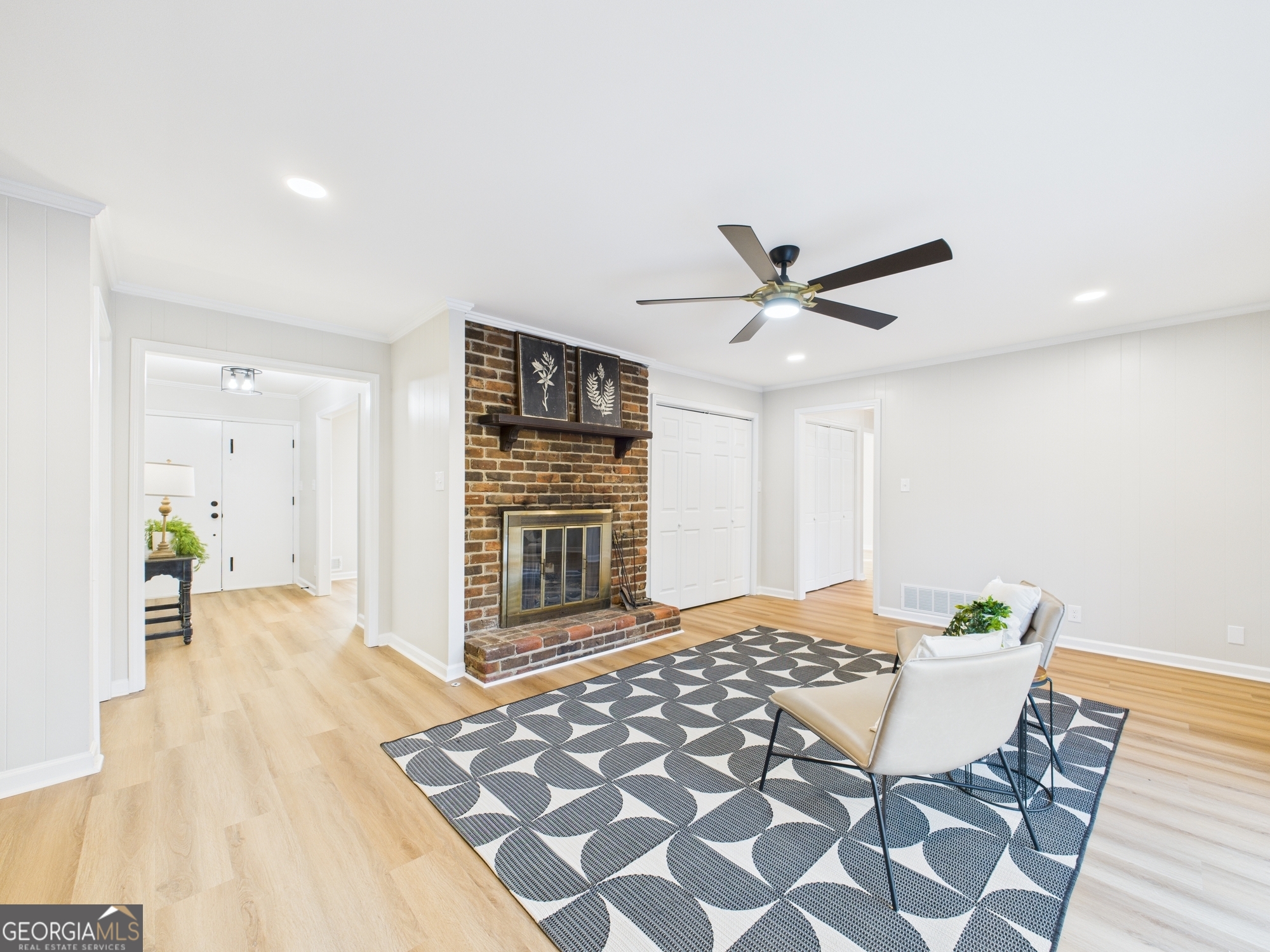 511 Pierce Avenue Macon, GA 31204 - Photo 10 of 57 a workspace with wooden floor and a ceiling fan