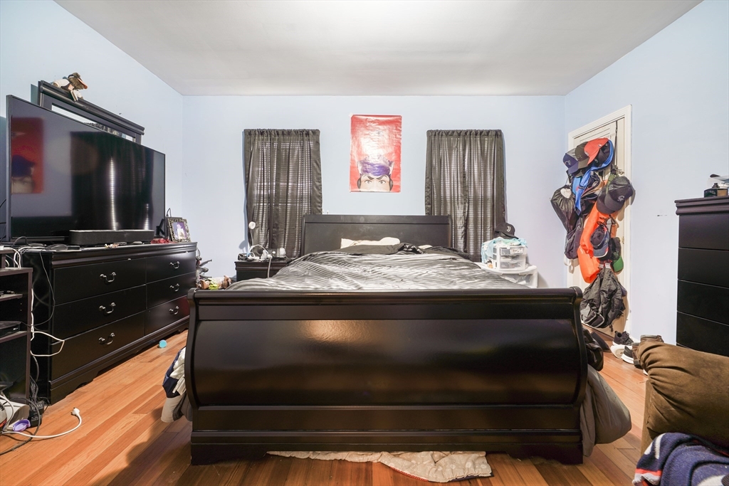 377 Hartwell Street Fall River, MA 02721 - Photo 17 of 31 a living room with furniture and a flat screen tv
