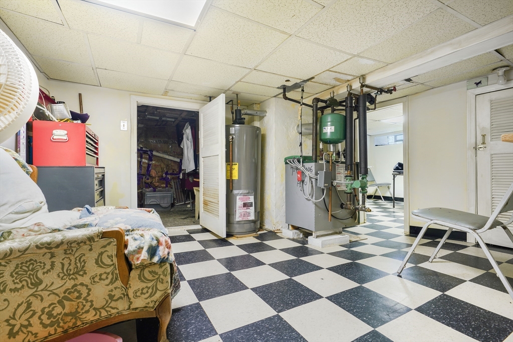 377 Hartwell Street Fall River, MA 02721 - Photo 25 of 31 a bedroom with a bed and a mirror on the dresser