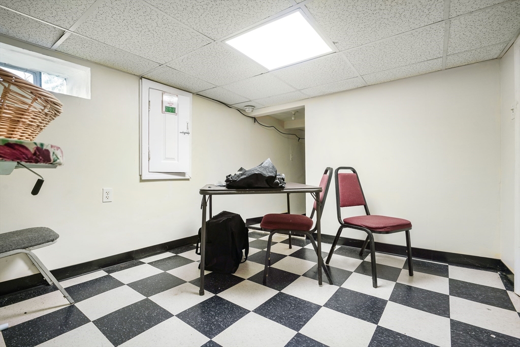 377 Hartwell Street Fall River, MA 02721 - Photo 27 of 31 a room with a black white checkered floor