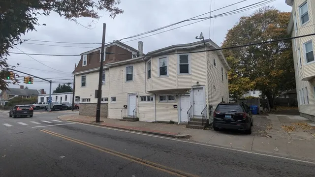 a car parked in front of a house