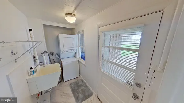 a view of a bedroom with a furniture and staircase
