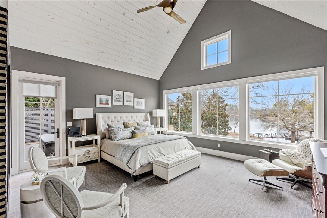 438 Winchester Lane Sunset, SC 29685 - Photo 13 of 47 This spacious bedroom offers serene views, a vaulted ceiling, and ample natural light.