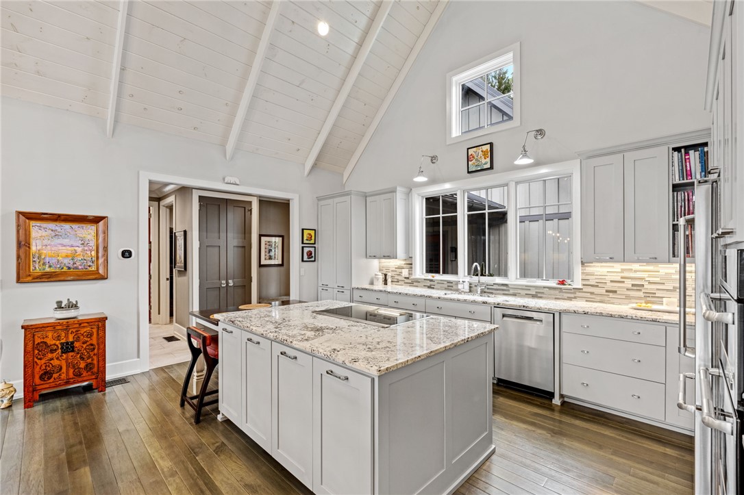 438 Winchester Lane Sunset, SC 29685 - Photo 6 of 47 This spacious kitchen offers a vaulted ceiling, a large island, and ample counter space for all your culinary needs.