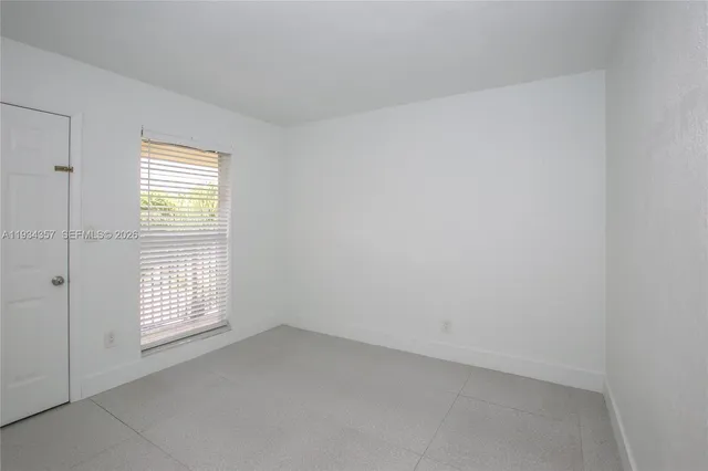 $220,000 | 241 South Royal Poinciana Boulevard, Unit 305, Miami Springs, FL 33166