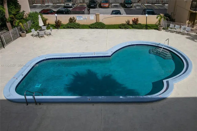 $220,000 | 241 South Royal Poinciana Boulevard, Unit 305, Miami Springs, FL 33166