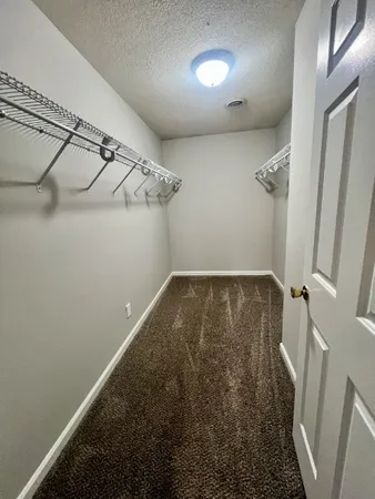 a view of a room with racks on the wall