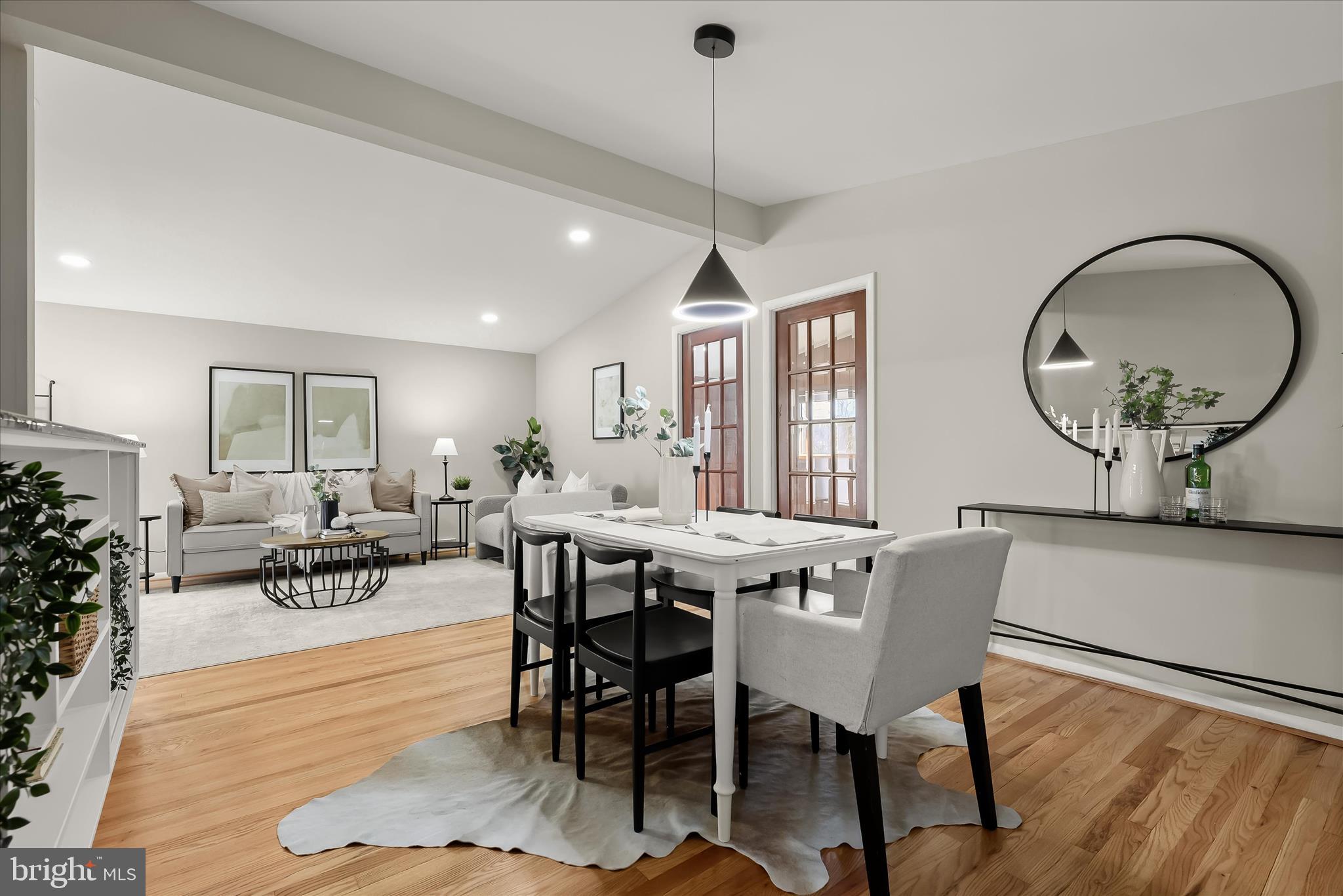 1009 Flagtree Lane Baltimore, MD 21208 - Photo 58 of 61 a view of a dining room with furniture window and wooden floor