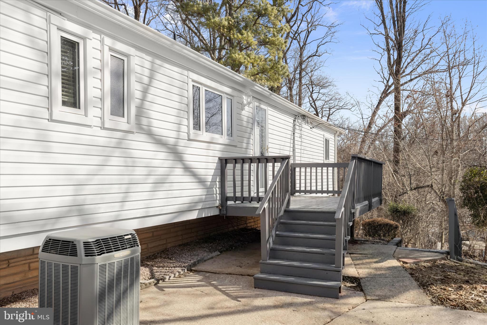 1009 Flagtree Lane Baltimore, MD 21208 - Photo 33 of 61 a view of a house with a bench