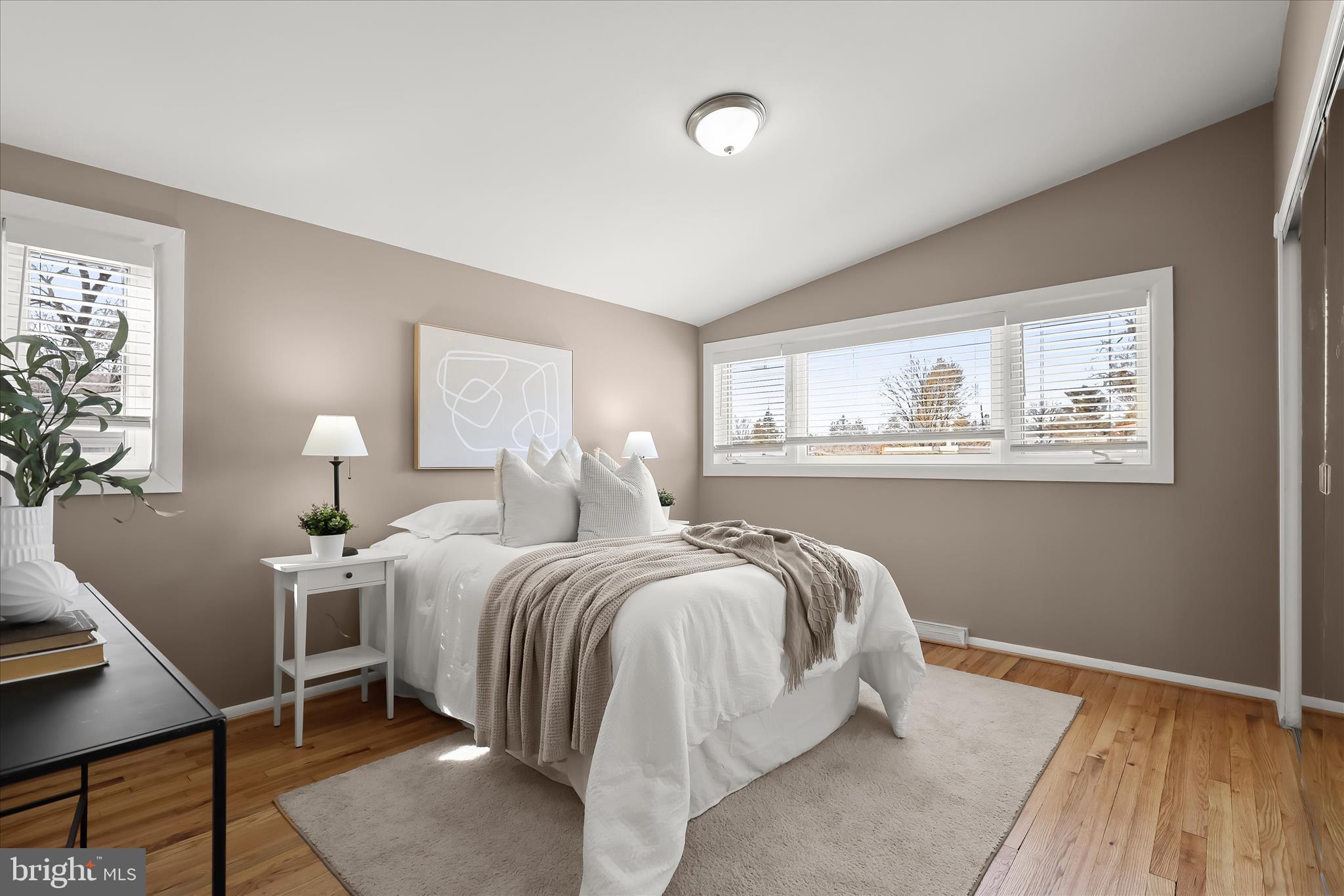 1009 Flagtree Lane Baltimore, MD 21208 - Photo 39 of 61 a bed room with a bed and a window