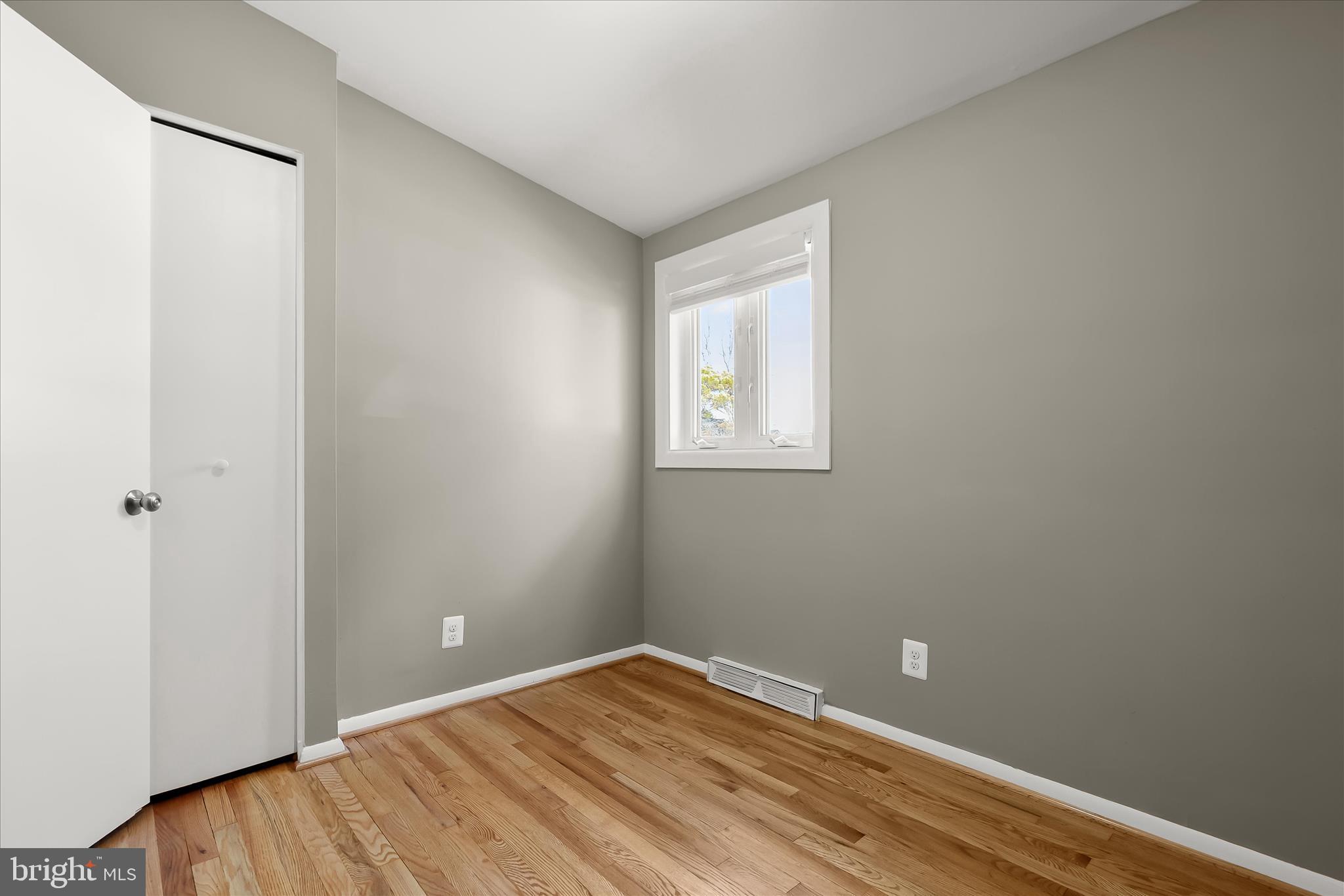 1009 Flagtree Lane Baltimore, MD 21208 - Photo 45 of 61 a view of room with window and hardwood floor
