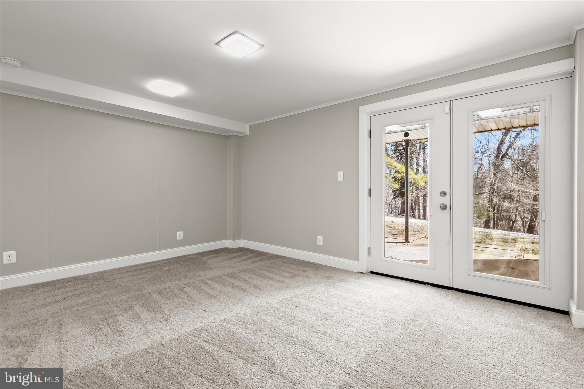 1009 Flagtree Lane Baltimore, MD 21208 - Photo 52 of 61 a view of an empty room with a window