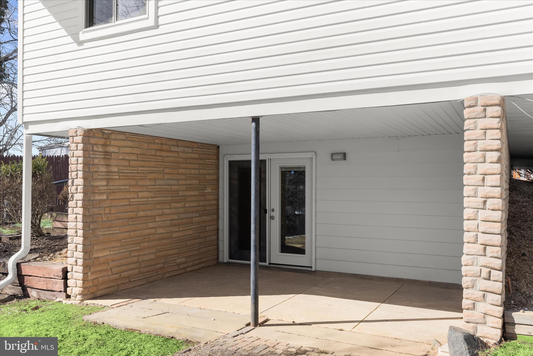 1009 Flagtree Lane Baltimore, MD 21208 - Photo 54 of 61 a view of a house with a garage