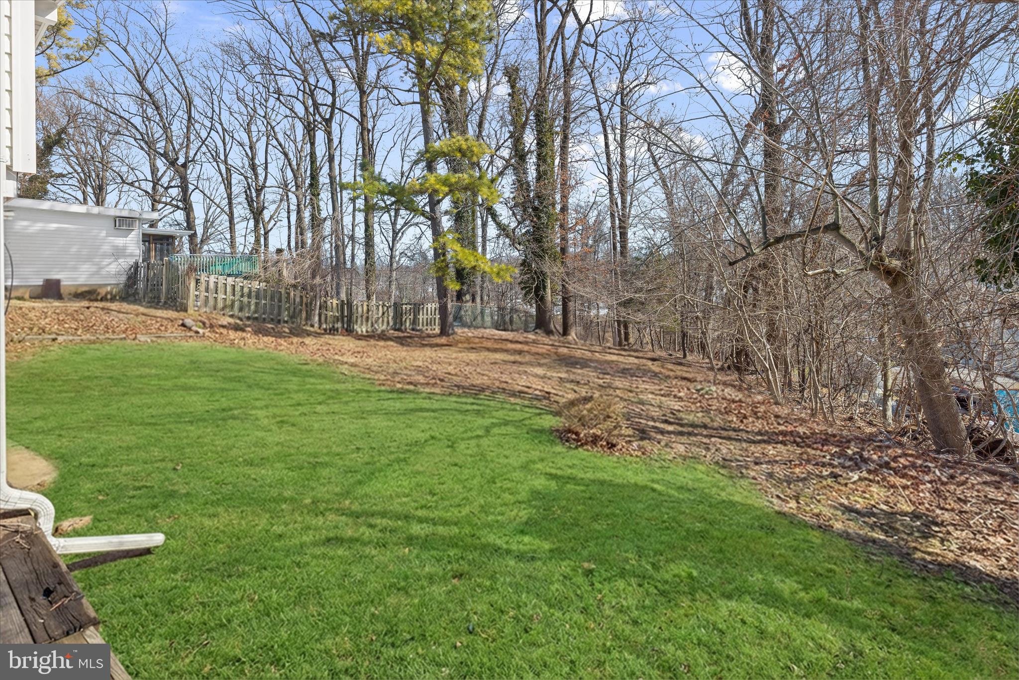 1009 Flagtree Lane Baltimore, MD 21208 - Photo 56 of 61 a backyard of a house with lots of green space