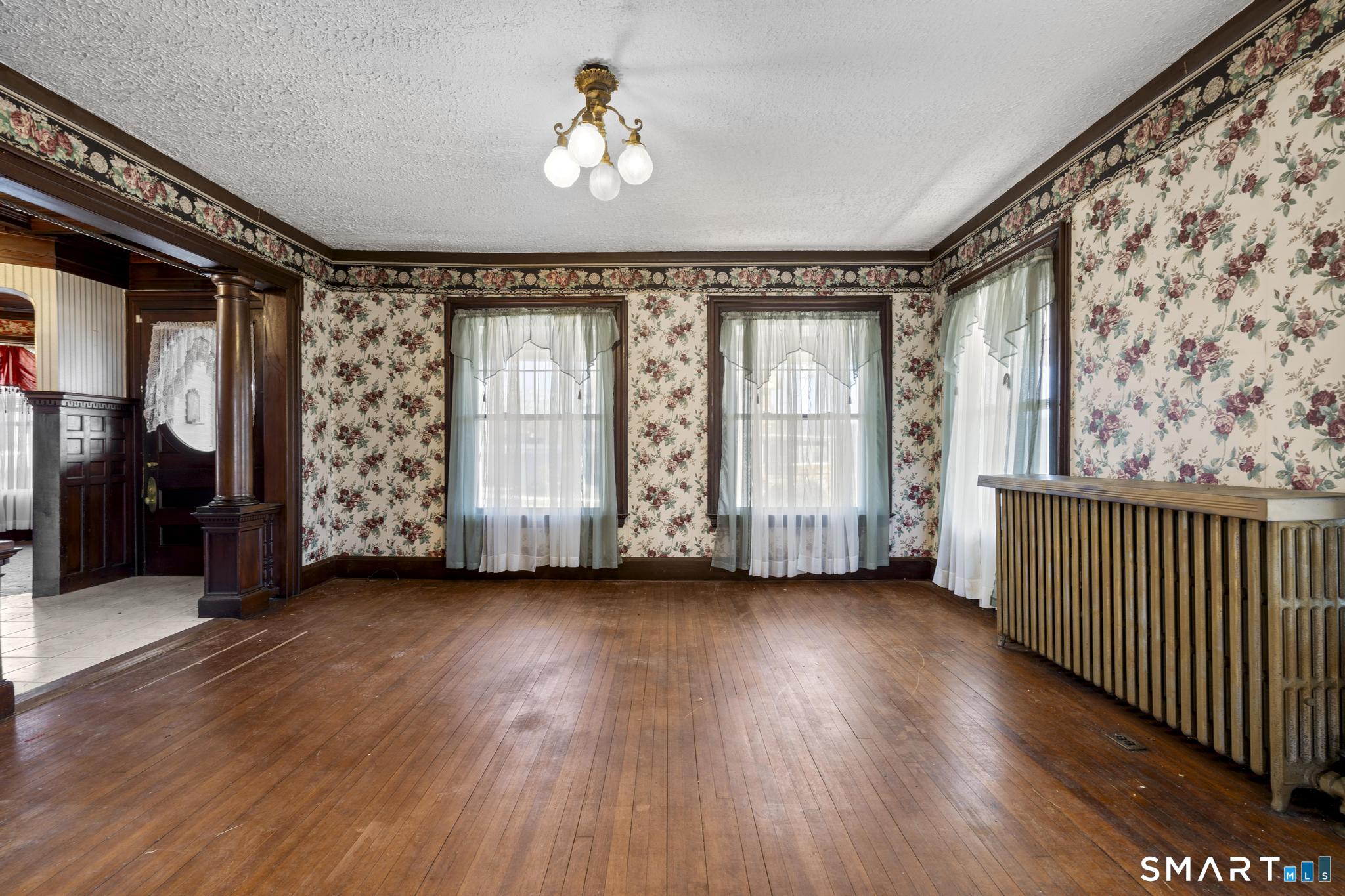4 Fairview Terrace Derby, CT 06418 - Photo 11 of 34 wooden floor in an empty room with a window