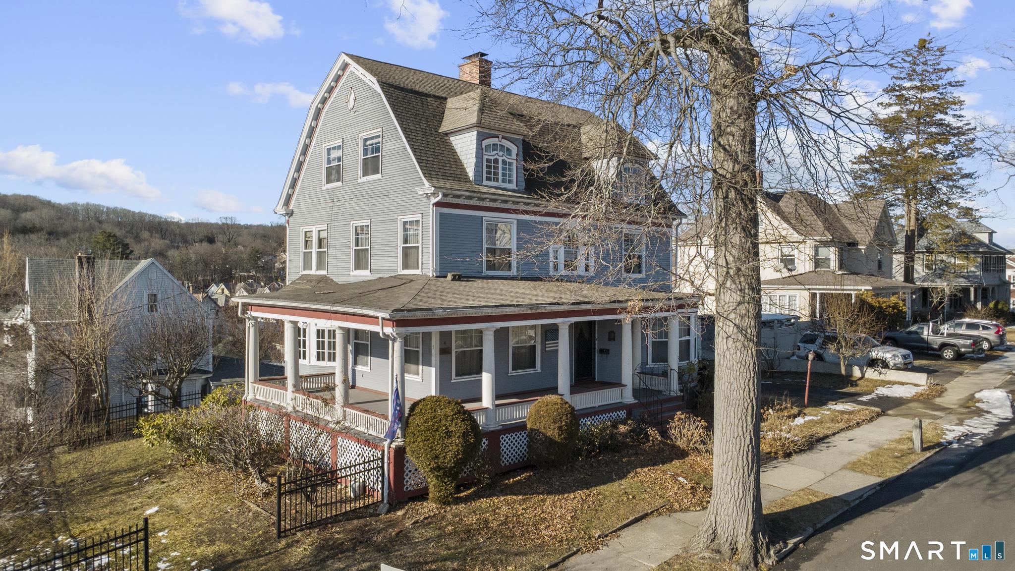 4 Fairview Terrace Derby, CT 06418 - Photo 24 of 34 a front view of a house with a yard