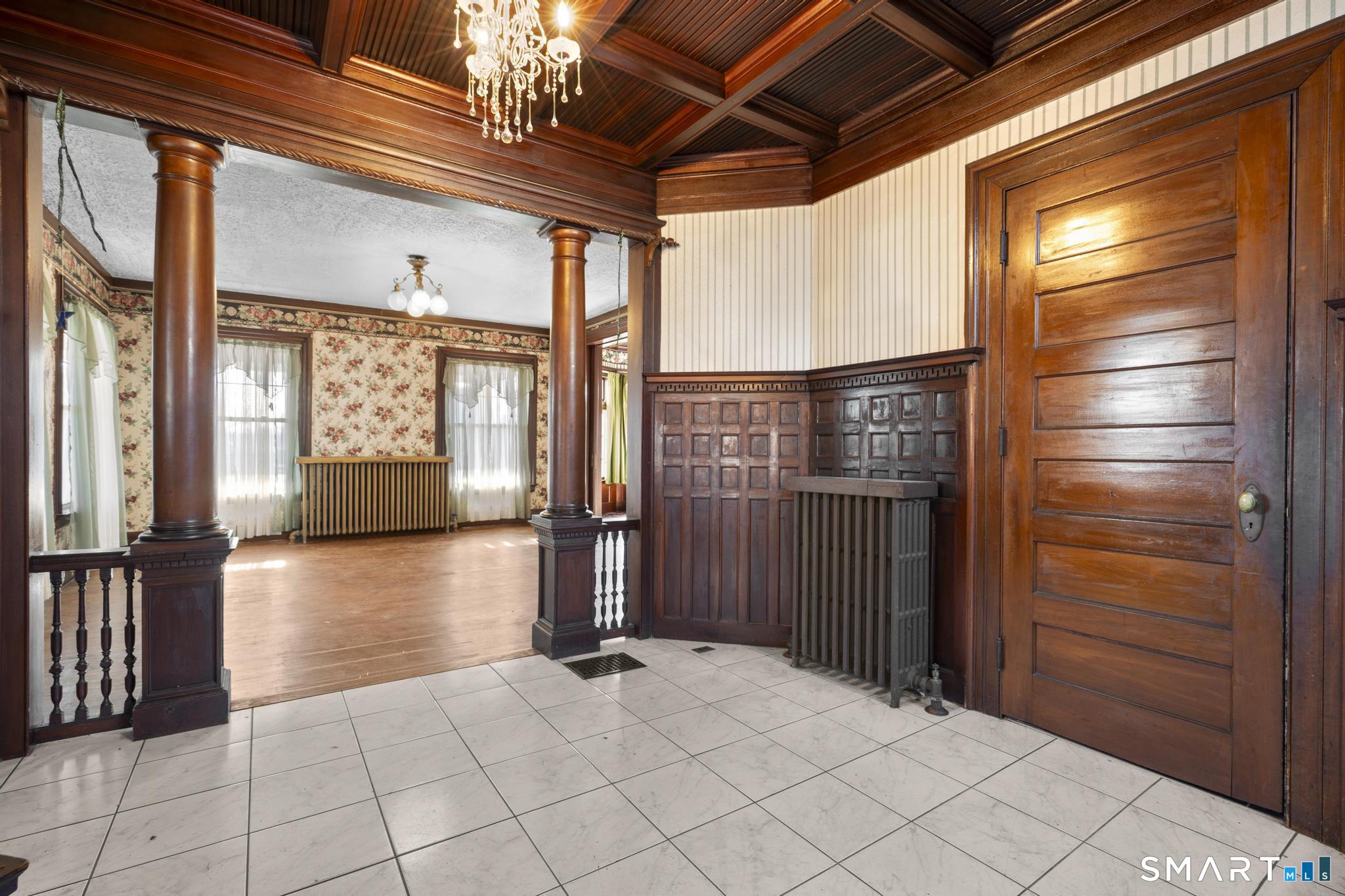 4 Fairview Terrace Derby, CT 06418 - Photo 3 of 34 a view of hallway with window and chandelier