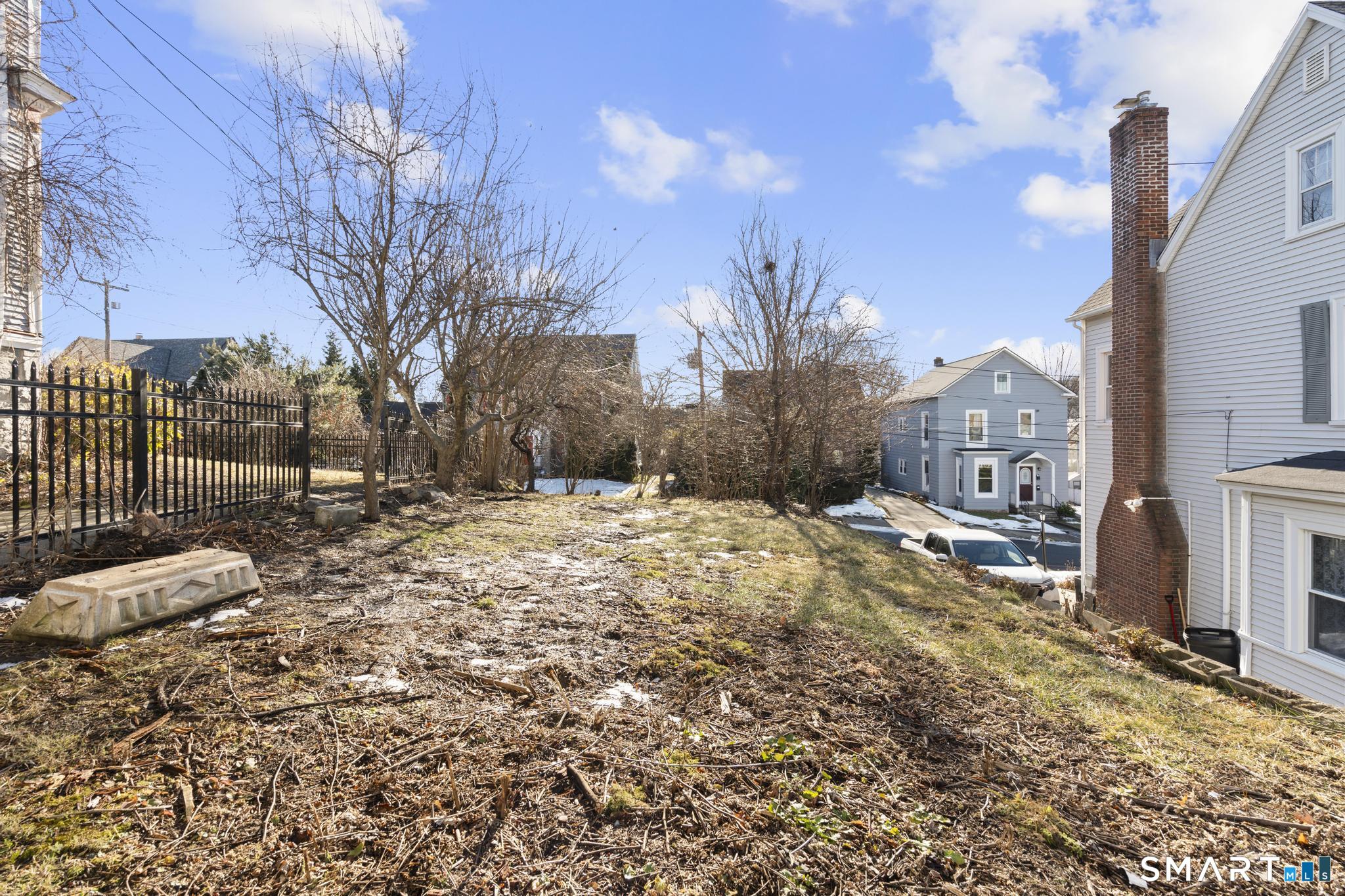 4 Fairview Terrace Derby, CT 06418 - Photo 32 of 34 a view of a yard covered in snow