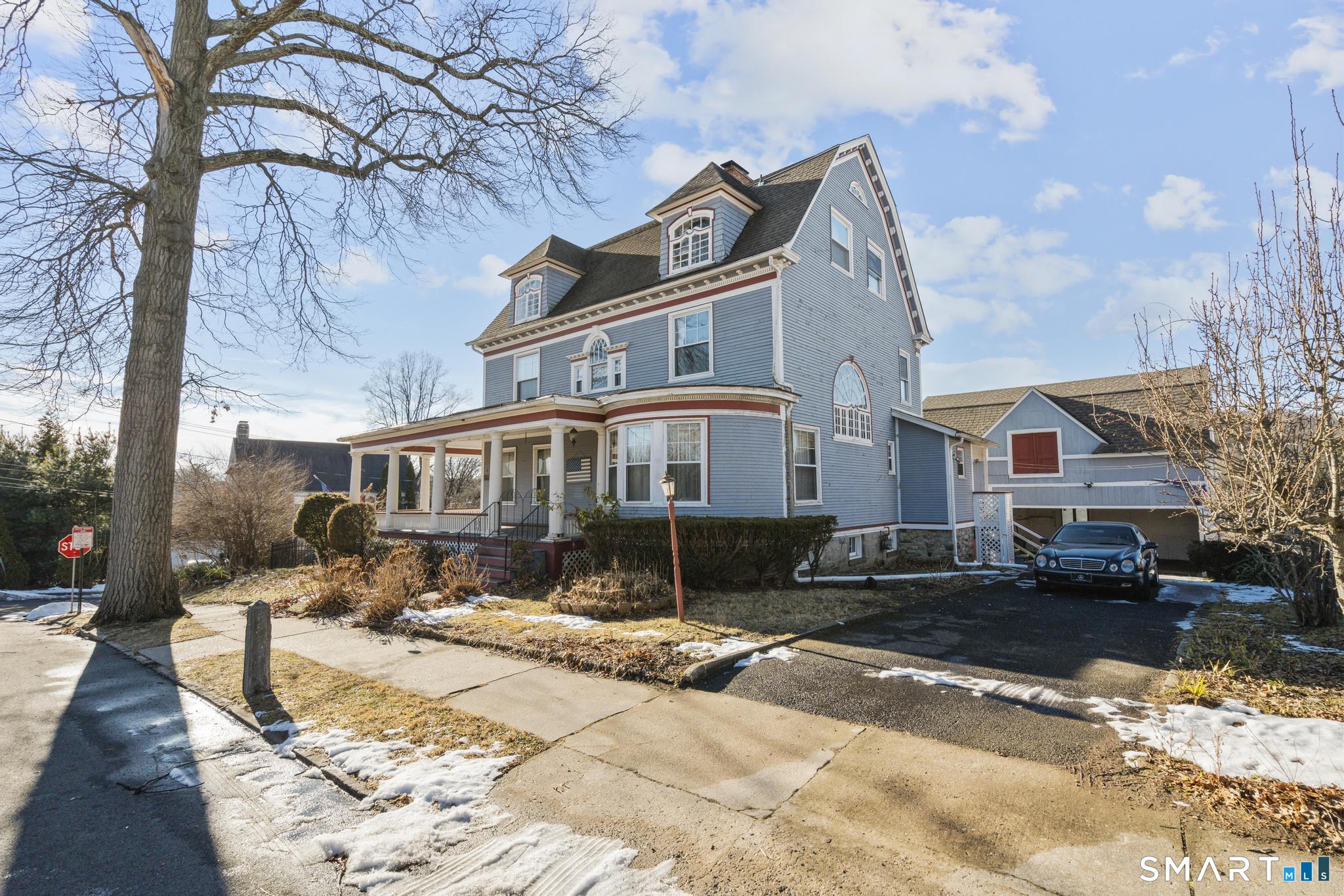 4 Fairview Terrace Derby, CT 06418 - Photo 34 of 34 a front view of a building with a yard