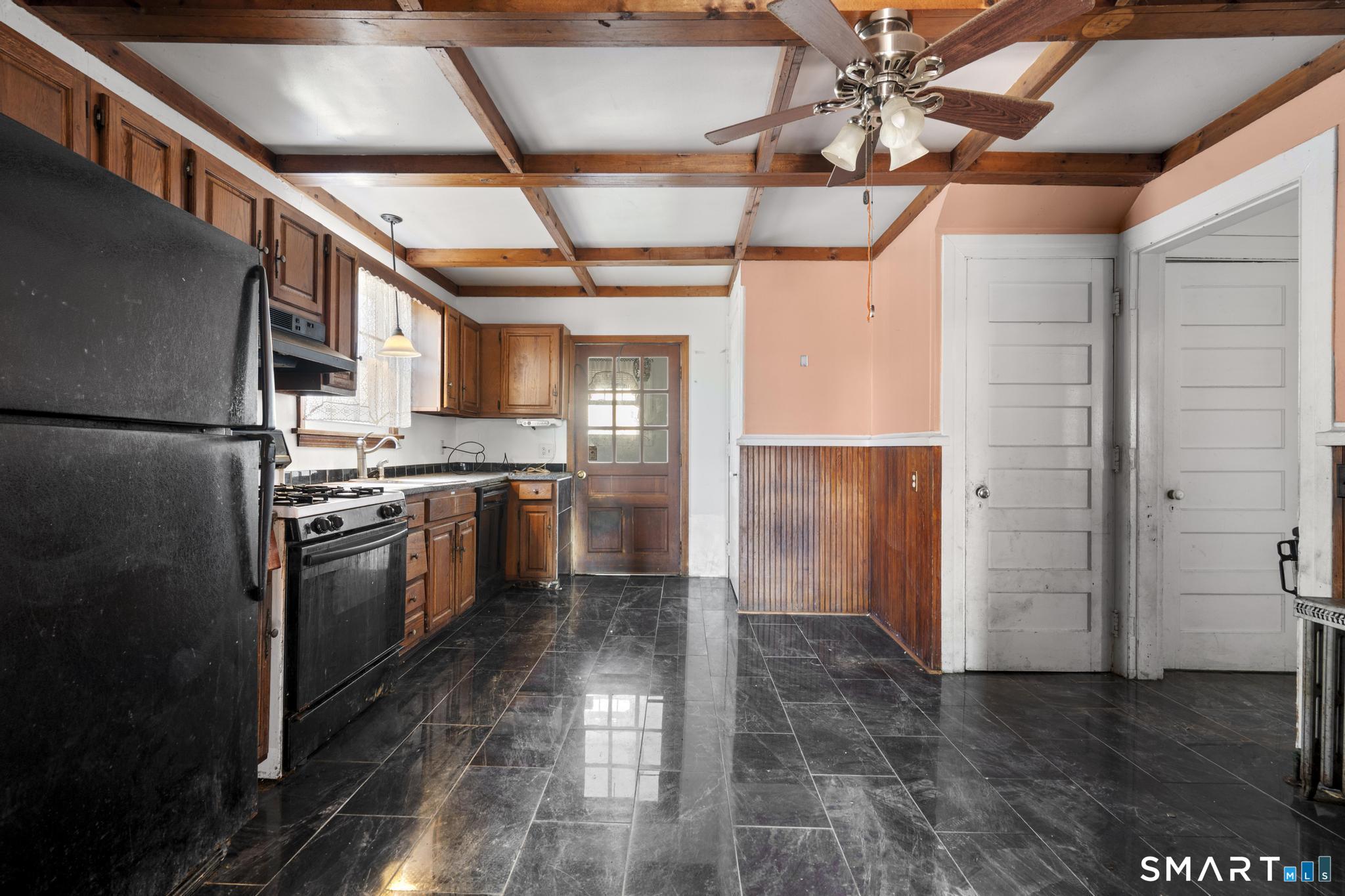 4 Fairview Terrace Derby, CT 06418 - Photo 8 of 34 a kitchen with stainless steel appliances granite countertop a refrigerator and a stove