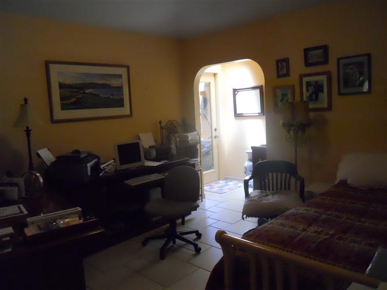 19472 Farallon Road Madera, CA 93638 - Photo 17 of 37 Office or third bedroom with Exit to backyard.