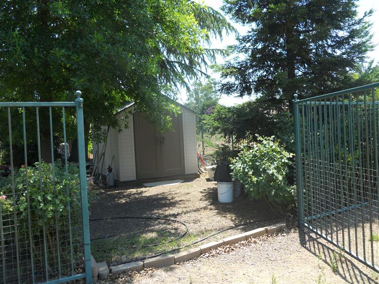 19472 Farallon Road Madera, CA 93638 - Photo 30 of 37 Exit to Country Club and Golf Course Shed can be used to store your Golf cart.