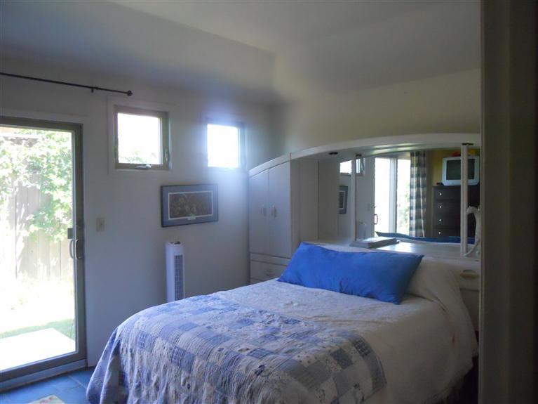 The blue room Blue Italian Porcelain tile with private bath entrance and backyard entrance.