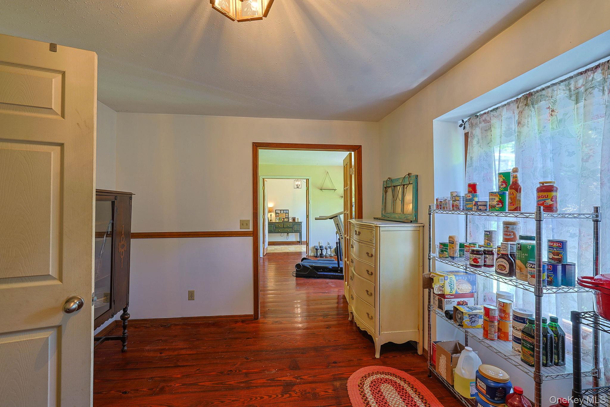 646 County Rte 93 Slate Hill, NY 10973 - Photo 9 of 21 The dining room is just off the kitchen and is utilized for storage by the current owners.