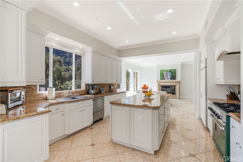 11 Baymare Road Bell Canyon, CA 91307 - Photo 14 of 39 a kitchen with sink a stove and cabinets
