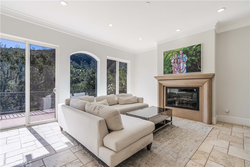11 Baymare Road Bell Canyon, CA 91307 - Photo 19 of 39 a living room with furniture and a fireplace