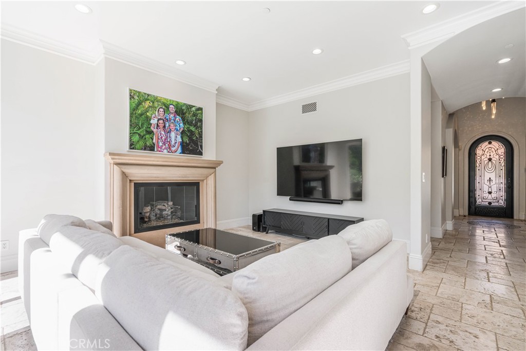 11 Baymare Road Bell Canyon, CA 91307 - Photo 20 of 39 a living room with furniture and a fireplace