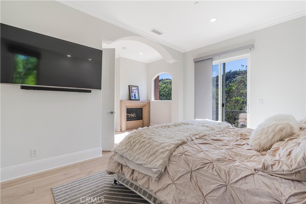 11 Baymare Road Bell Canyon, CA 91307 - Photo 22 of 39 a bedroom with a bed and a flat screen tv
