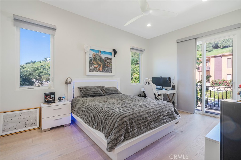 11 Baymare Road Bell Canyon, CA 91307 - Photo 26 of 39 a bedroom with a large bed and a window