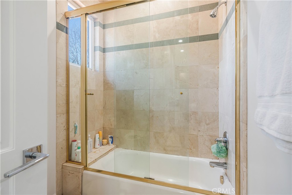 11 Baymare Road Bell Canyon, CA 91307 - Photo 31 of 39 a bathroom with a bathtub and a shower