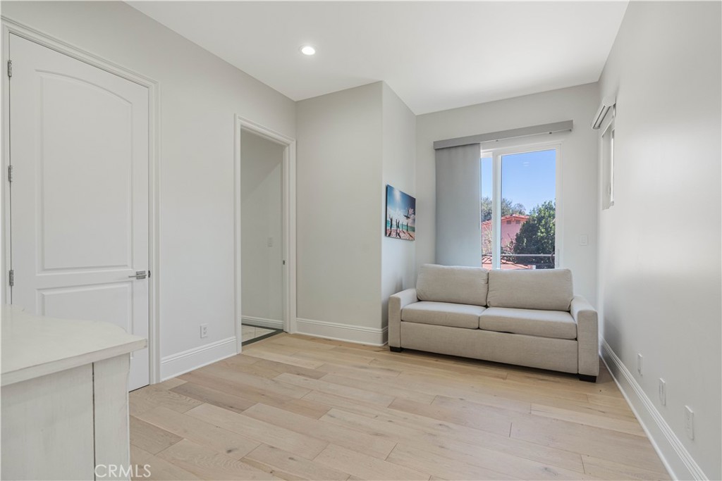 11 Baymare Road Bell Canyon, CA 91307 - Photo 32 of 39 a living room with furniture and a window