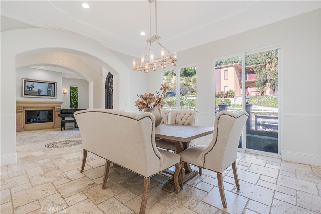 11 Baymare Road Bell Canyon, CA 91307 - Photo 7 of 39 a dining room with furniture a chandelier and window