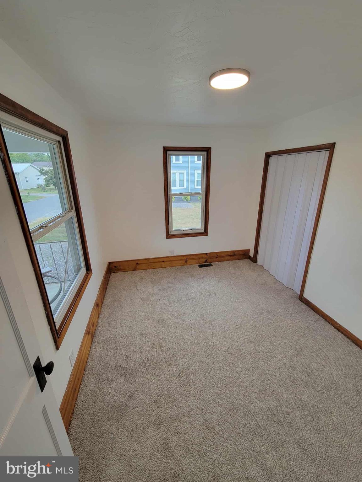 14204 Temple Street Ellerslie, MD 21529 - Photo 12 of 31 a view of an empty room with a window