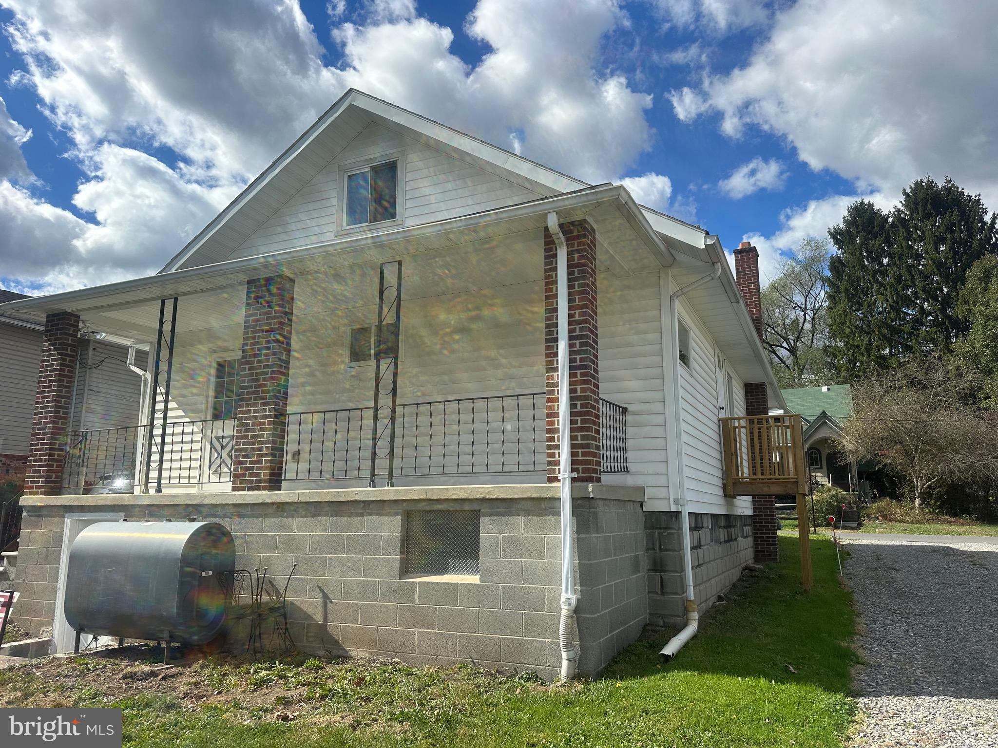 14204 Temple Street Ellerslie, MD 21529 - Photo 25 of 31 a front view of a house with a yard