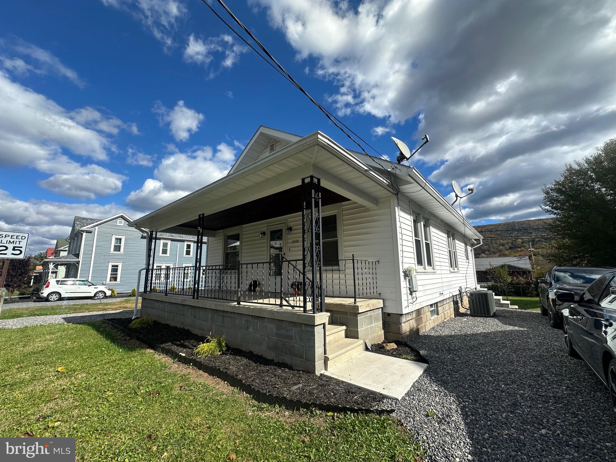 14204 Temple Street Ellerslie, MD 21529 - Photo 26 of 31 a view of a house with backyard and sitting area