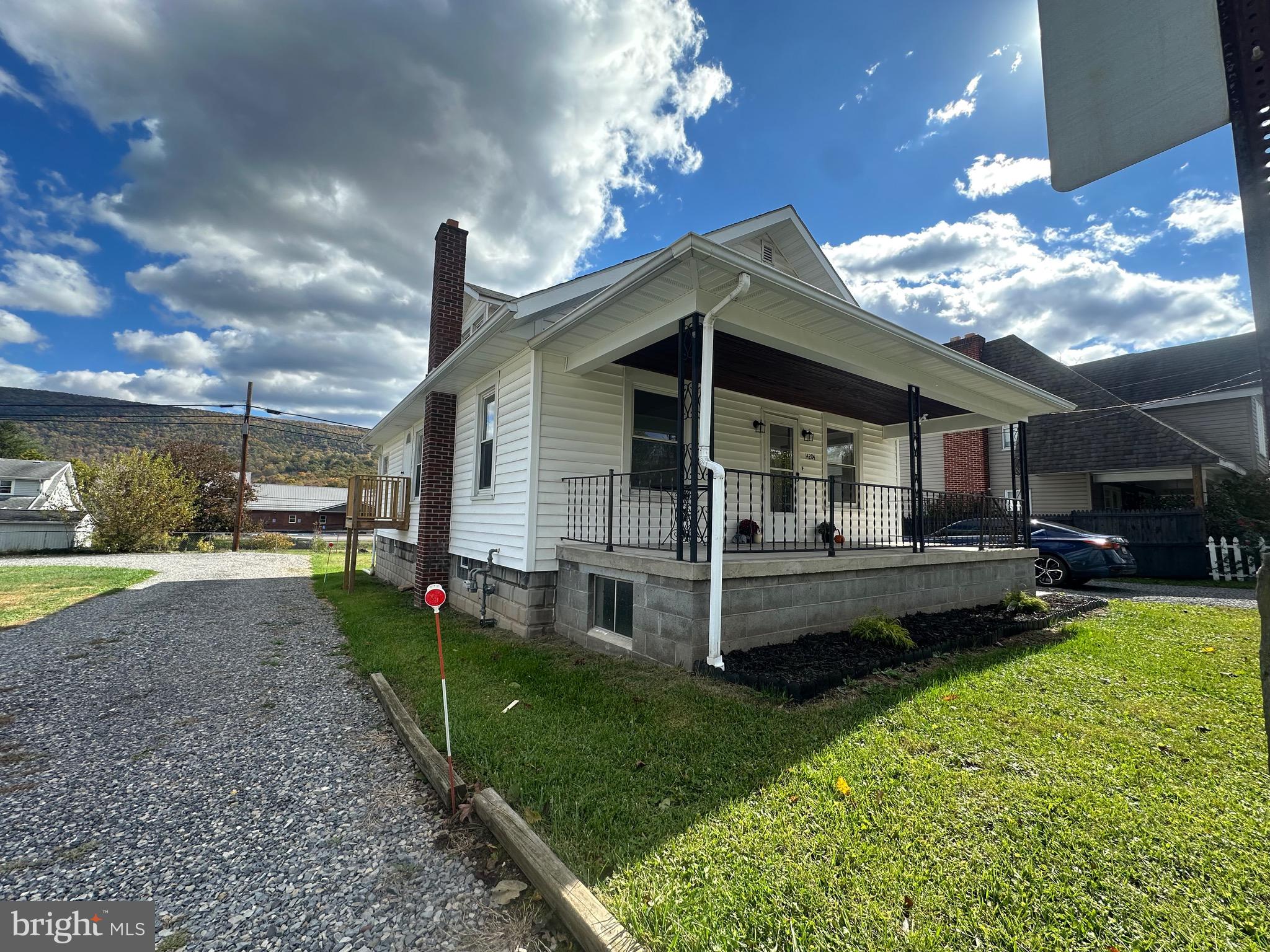14204 Temple Street Ellerslie, MD 21529 - Photo 3 of 31 a view of a house with backyard and sitting area