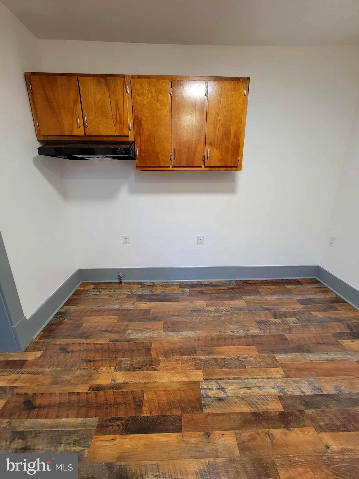 14204 Temple Street Ellerslie, MD 21529 - Photo 8 of 31 a view of room and wooden floor